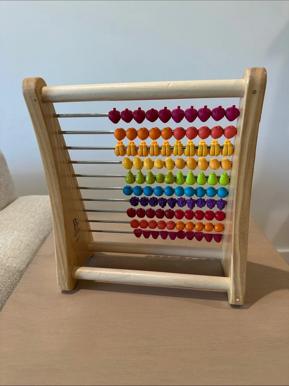 B. toys Wooden Abacus, Two-Ty Fruity Counting Toy